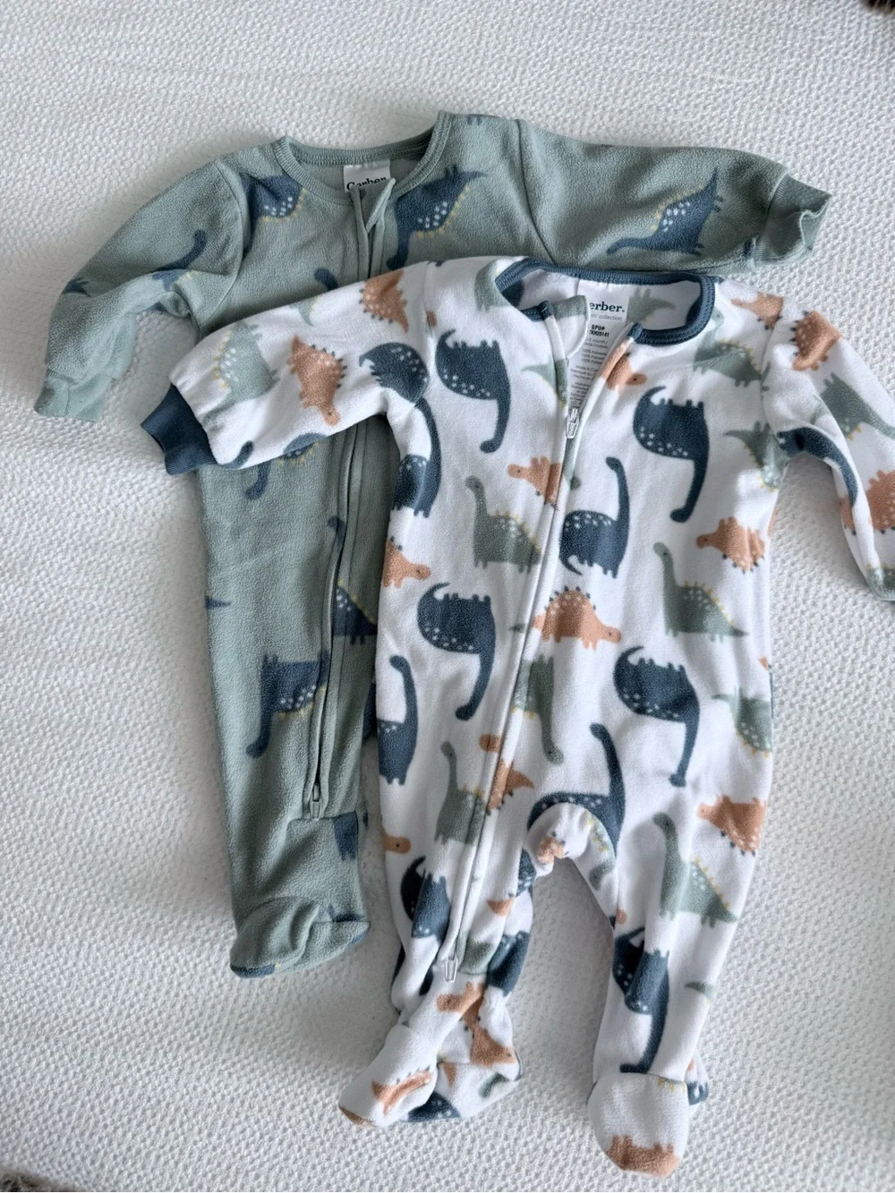 4-Pack Multi-Color Baby Fleece Footed Onesies- Dinosaur & Sheep Prints